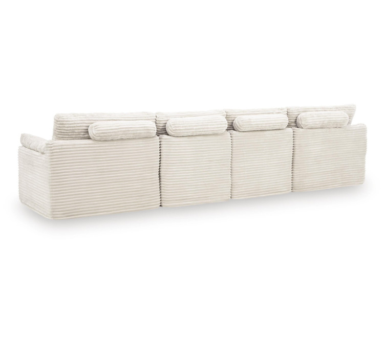 Canefield 4-Piece Sectional with Ottoman - Ivory