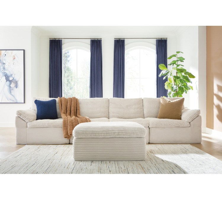 Canefield 4-Piece Sectional with Ottoman - Ivory