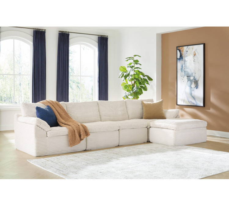 Canefield 4-Piece Sectional with Ottoman - Ivory