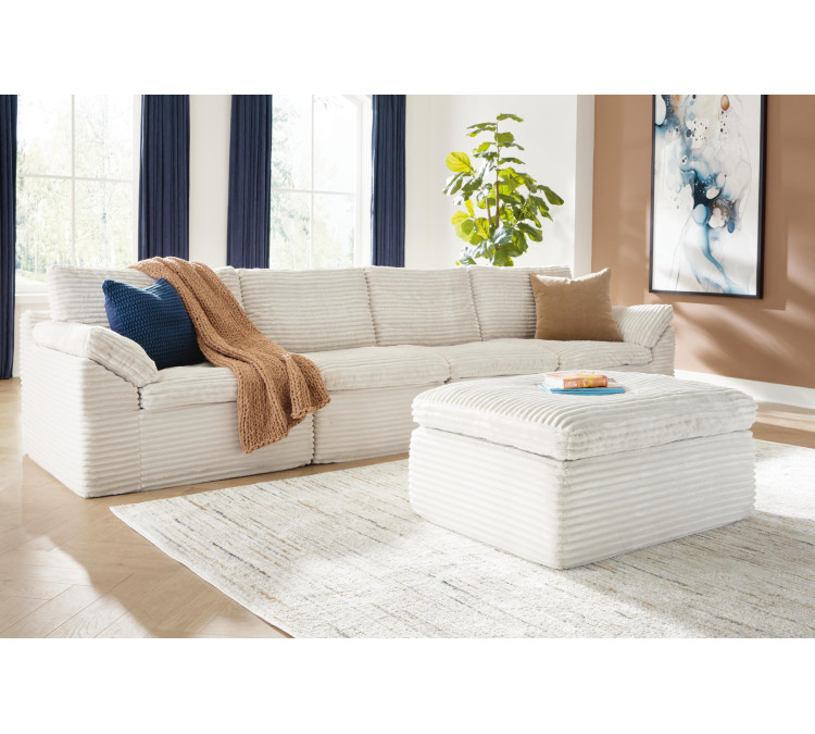 Canefield 4-Piece Sectional with Ottoman - Ivory