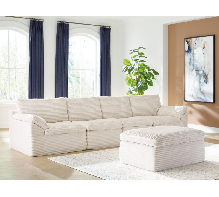Canefield 4-Piece Sectional with Ottoman - Ivory
